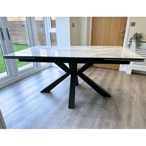 Phoenix - White Polished Ceramic Extending Dining Table - 120-180cm - Starburst Black Legs